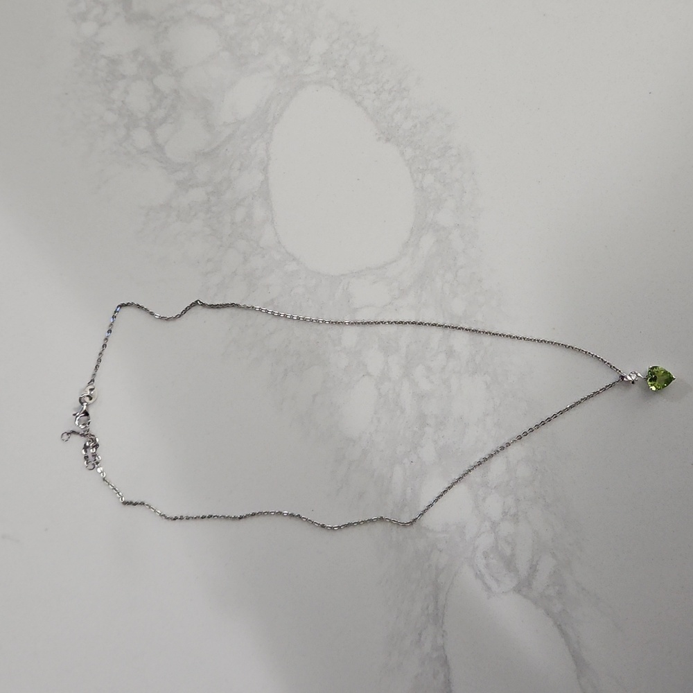 Heart Shaped Peridot Birthstone Necklace With Small Diamond
